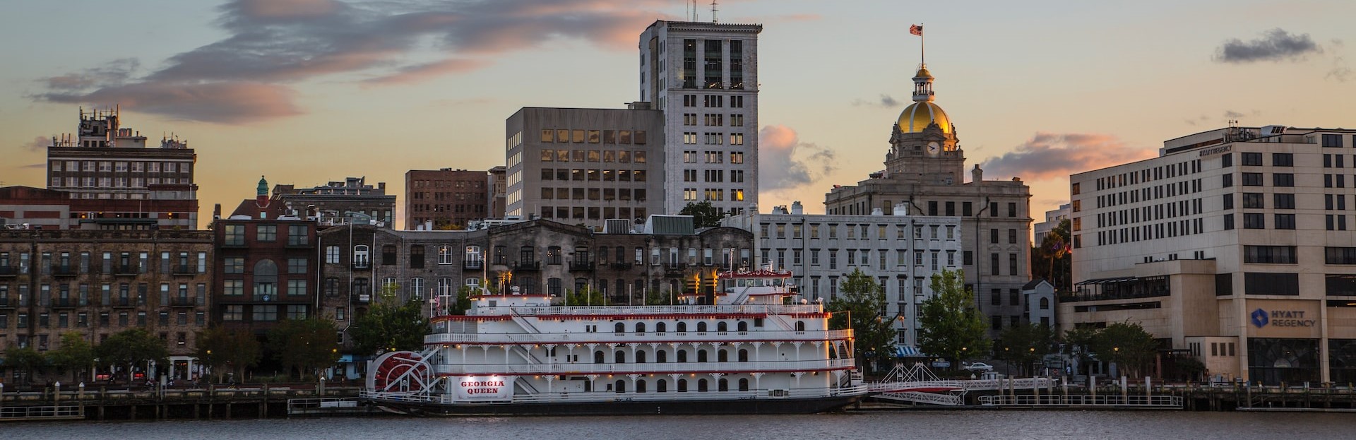 White and Brown boat on the sea in Savannah | Breast Cancer Car Donations