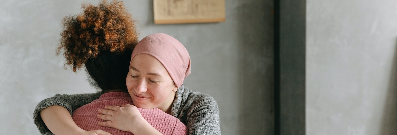 Woman Hugging | Breast Cancer Car Donations