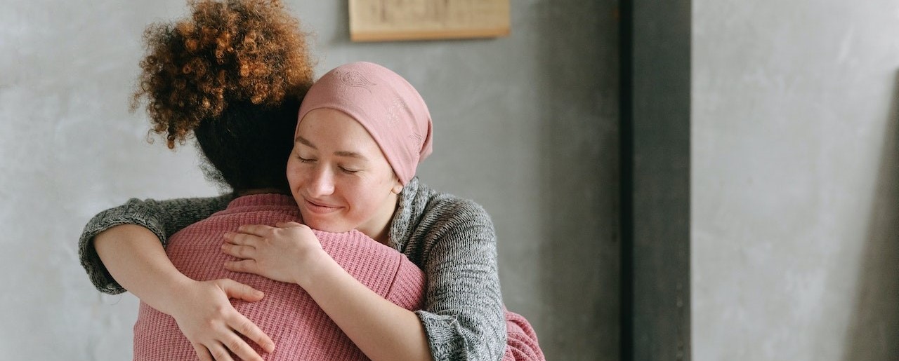 Women Hugging Each Other (2) | Breast Cancer Car Donations