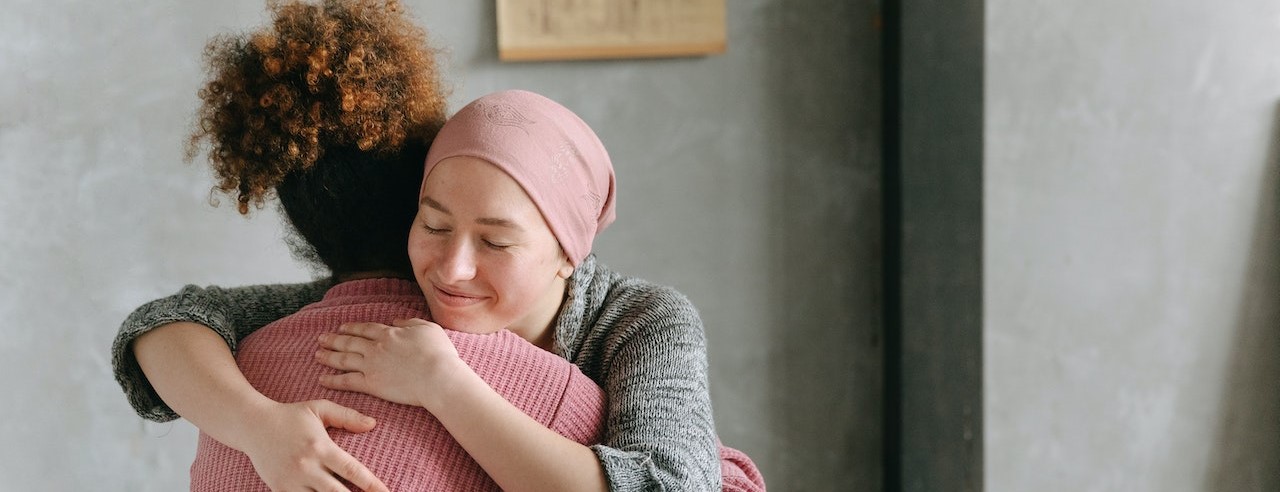 Women Hugging Each Other | Breast Cancer Car Donations