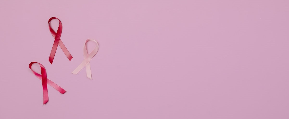Breast Cancer Pink Ribbons on Pink Background | Breast Cancer Car Donations