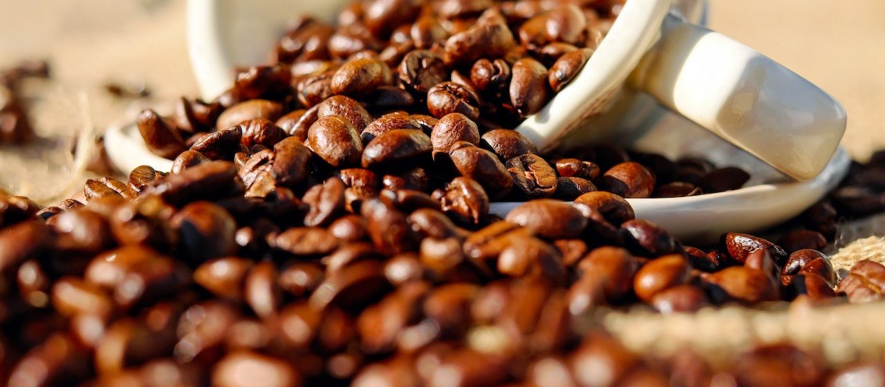 Coffee Beans on White Ceramic Cup | Breast Cancer Car Donations