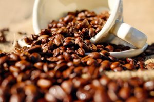 Coffee Beans on White Ceramic Cup | Breast Cancer Car Donations
