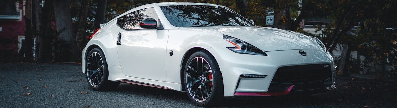 A White Nissan 370z | Breast Cancer Car Donations