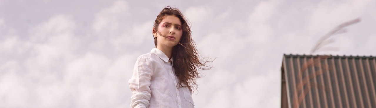 Photo of Woman Wearing White Dress Shirt | Breast Cancer Car Donations