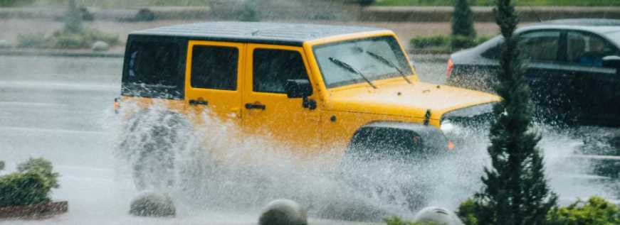 Yellow Jeep on Flood | Breast Cancer Car Donations