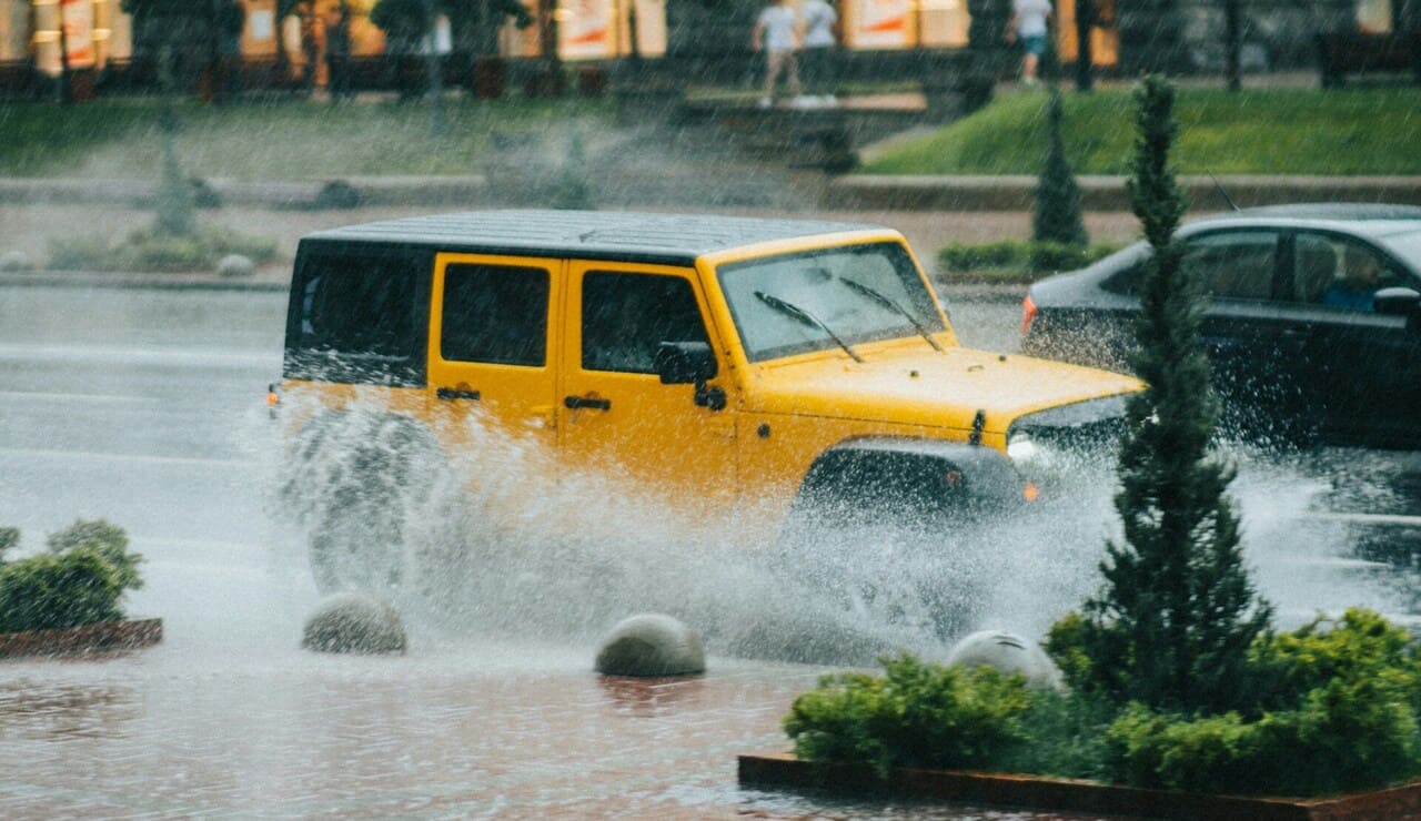 Yellow Jeep on Flood | Breast Cancer Car Donations