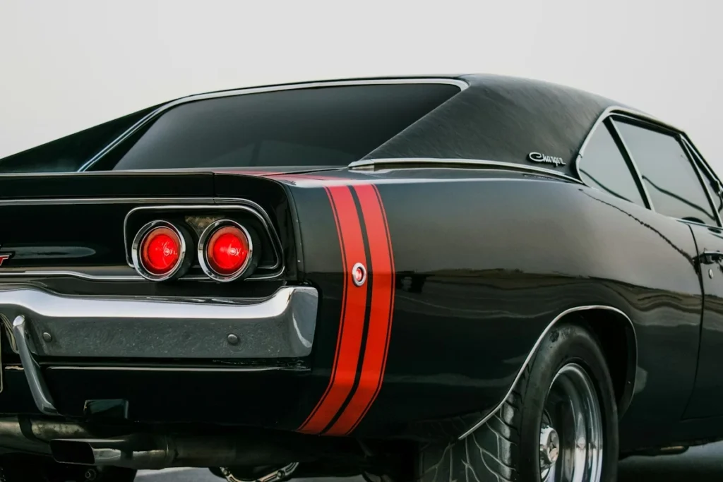 Vintage black car with red stripes