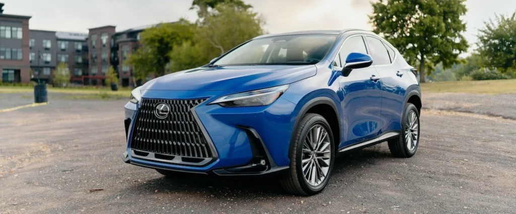 Blue Lexus SUV parked in an outdoor urban area on a clear day