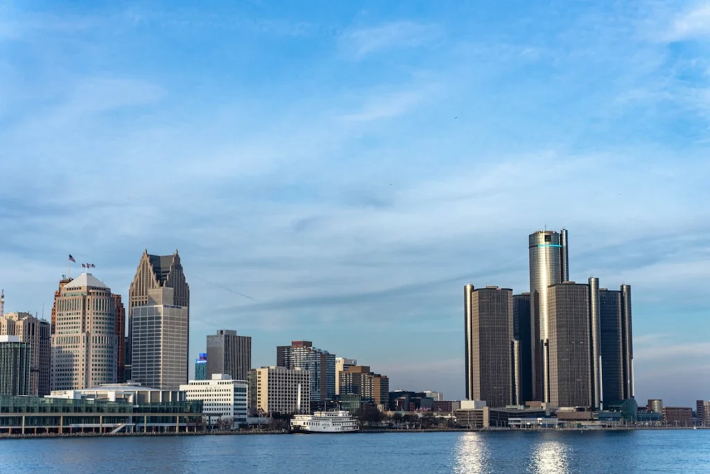A large body of water with a city in the background
