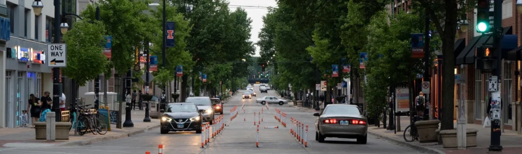 Cars on road near buildings during daytime